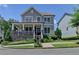 Charming two-story home featuring a welcoming front porch and beautifully landscaped front yard at 3621 Portland Trail Dr, Suwanee, GA 30024