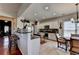 Bright, modern kitchen featuring granite countertops, stainless steel appliances, and eat-in breakfast area at 3621 Portland Trail Dr, Suwanee, GA 30024