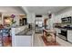 Bright kitchen featuring granite countertops, stainless steel appliances, and tile flooring at 3621 Portland Trail Dr, Suwanee, GA 30024