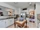Bright kitchen with granite countertops, stainless steel appliances, and cream-colored cabinetry at 3621 Portland Trail Dr, Suwanee, GA 30024