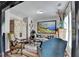 Charming living room features a mix of vintage and modern decor with comfortable seating and ample natural light at 3621 Portland Trail Dr, Suwanee, GA 30024