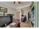 Cozy home office featuring built-in shelving and decorative furniture at 3621 Portland Trail Dr, Suwanee, GA 30024