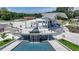 Public space featuring a waterfall and open-air pavilion with tables and seating areas at 3621 Portland Trail Dr, Suwanee, GA 30024