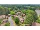 Neighborhood aerial showcasing mature trees and the community's architecture and landscaping at 107 Mary Gay Ct, Decatur, GA 30030