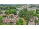 Aerial view of a neighborhood, featuring mature trees and well-maintained homes at 107 Mary Gay Ct, Decatur, GA 30030