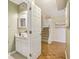 Bathroom and stairway visible through a door and a hallway at 107 Mary Gay Ct, Decatur, GA 30030