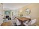 Bright dining room with hardwood floors and view of living area; perfect for entertaining and Gathering meals at 107 Mary Gay Ct, Decatur, GA 30030