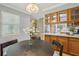 Eat-in kitchen with a table, wood cabinets, and bright light at 107 Mary Gay Ct, Decatur, GA 30030