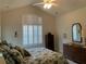 Bedroom features vaulted ceiling and plantation shutters allowing for natural light at 1301 Haven Cir, Douglasville, GA 30135