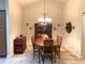 Elegant dining room with chandelier lighting and decorative accents at 1301 Haven Cir, Douglasville, GA 30135