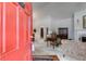 Open foyer with views of the living room, dining room, and a striking red front door at 1301 Haven Cir, Douglasville, GA 30135