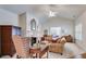 Cozy living room with vaulted ceilings, fireplace, and ample natural light at 1301 Haven Cir, Douglasville, GA 30135