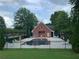 Community pool area with ample seating and a well-maintained pool house at 1301 Haven Cir, Douglasville, GA 30135