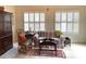 Bright sunroom with plantation shutters allowing for natural light at 1301 Haven Cir, Douglasville, GA 30135