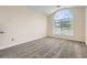 Inviting bedroom is enhanced by a large arched window offering lots of natural light at 3599 Brookstone Way, Union City, GA 30291