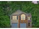 Inviting two-story home with a brick facade and well-kept landscaping at 3599 Brookstone Way, Union City, GA 30291