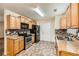 Efficient kitchen features modern appliances, granite countertops, and mosaic backsplash at 3599 Brookstone Way, Union City, GA 30291