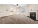 Spacious living room with a fireplace, neutral carpet, and ample natural light at 3599 Brookstone Way, Union City, GA 30291