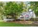 The home's backyard is complete with a deck, patio, and pergola for entertaining at 5219 Legendary Ln, Acworth, GA 30102