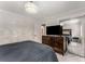 Primary bedroom with a dark wood dresser and a mirrored closet at 5219 Legendary Ln, Acworth, GA 30102