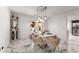 Dining area with stylish bar, white plank walls, and views to the patio at 5219 Legendary Ln, Acworth, GA 30102