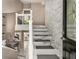 Welcoming entryway with marble stairs and stone accent wall at 5219 Legendary Ln, Acworth, GA 30102