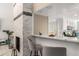 Kitchen with marble countertops, modern lighting, and breakfast bar seating at 5219 Legendary Ln, Acworth, GA 30102