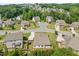 Aerial view of a well-manicured community with mature trees at 1374 Highland Wood Ct, Auburn, GA 30011