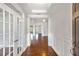 Welcoming foyer with hardwood floors, elegant molding, and bright, airy ambiance at 1374 Highland Wood Ct, Auburn, GA 30011