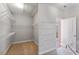 Walk-in closet with wire shelving and lots of space to hang and store your clothing at 1374 Highland Wood Ct, Auburn, GA 30011