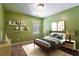 Bedroom with carpet, window, and decorative shelves at 208 Oconee Way, Canton, GA 30114