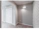 Spacious basement featuring painted brick, carpeted floor, and utility access at 260 Pleasant Grove Cir, Mcdonough, GA 30252
