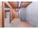 Unfinished basement with concrete flooring and exposed beams at 260 Pleasant Grove Cir, Mcdonough, GA 30252
