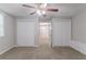 Finished basement featuring neutral walls, carpeted floors, and closet space at 260 Pleasant Grove Cir, Mcdonough, GA 30252