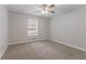 Bedroom with neutral paint, carpeting, and natural light at 260 Pleasant Grove Cir, Mcdonough, GA 30252