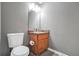Bathroom with a sink and toilet, essential for quick and easy access, perfect for guests and residents at 502 Gallantry Trl, Mcdonough, GA 30252