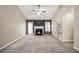Spacious living room featuring a cozy fireplace and vaulted ceiling at 502 Gallantry Trl, Mcdonough, GA 30252