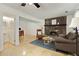 Open living room showcases a fireplace and access to the office and bathroom at 9685 Cone Ct, Roswell, GA 30075