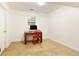 This office offers neutral walls, tile floors, and bright light from the window at 9685 Cone Ct, Roswell, GA 30075