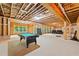 Unfinished basement featuring exposed ceiling with a pool table and recreation area at 127 Sanctuary Ave, Woodstock, GA 30188