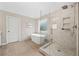 Beautiful bathroom featuring a freestanding tub and glass shower at 127 Sanctuary Ave, Woodstock, GA 30188