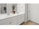 Bathroom featuring double sinks and white cabinets at 127 Sanctuary Ave, Woodstock, GA 30188
