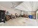 Spacious garage with ample storage space and a convenient overhead door at 127 Sanctuary Ave, Woodstock, GA 30188