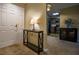 Inviting entryway with stylish console table and a glimpse of the kitchen enhances the condo's appeal at 1800 Clairmont Lk # 413, Decatur, GA 30033