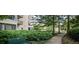 Exterior view of building with sidewalks and mature landscaping at 1800 Clairmont Lk # 413, Decatur, GA 30033