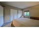 Calm bedroom with a plush bed, soft natural light, and ample storage space at 1800 Clairmont Lk # 413, Decatur, GA 30033