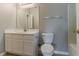 This is a standard bathroom with a single vanity and a large mirror at 3037 Botany Dr, Jonesboro, GA 30236