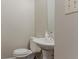 This bathroom features a toilet and sink with modern fixtures, perfect for a quick refresh at 3037 Botany Dr, Jonesboro, GA 30236