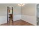 Open dining area with hardwood floors and easy access to the kitchen at 3037 Botany Dr, Jonesboro, GA 30236