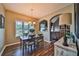 Charming dining area with hardwood floors and access to living room at 501 Grace Ct, Temple, GA 30179